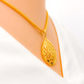 Sparkling Netted Leaf 22K Gold Pendant Set