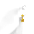 glimmering-feather-accented-22k-gold-jhumki-earrings-8