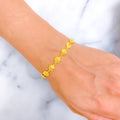 decorative-flower-lined-22k-gold-bracelet
