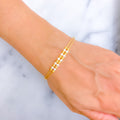 Shimmering Dual Lined 22k Gold Flexi Bangle Bracelet W/Pearl