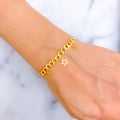 Dangling Dazzling Star Adorned 21k Gold Bracelet 