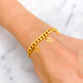 Dangling Dazzling Star Adorned 21k Gold Bracelet 