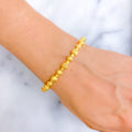 Luminescent Twinkling 22k Gold Orb Bangle Bracelet