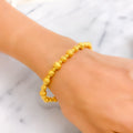 Luminescent Twinkling 22k Gold Orb Bangle Bracelet