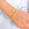Graceful Radiant Wave 22k Gold Orb Bangle Bracelet