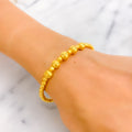 Graceful Radiant Wave 22k Gold Orb Bangle Bracelet