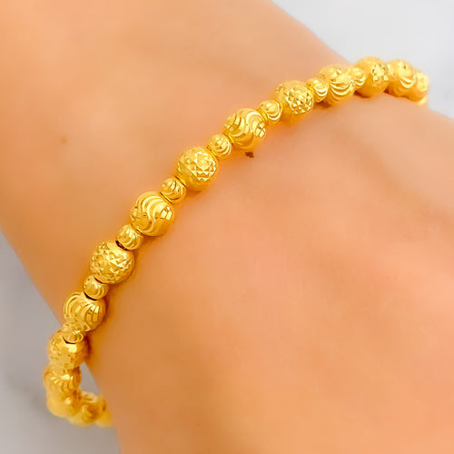 Captivating Contour 22k Gold Orb Bangle Bracelet 