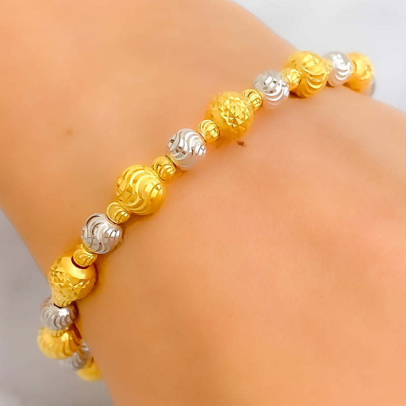 Brilliant Lustrous 22k Gold Orb Two-Tone Bangle Bracelet 