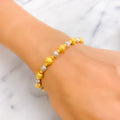 Brilliant Lustrous 22k Gold Orb Two-Tone Bangle Bracelet 
