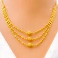 Delicate Glistening 22K Gold Three Lara Necklace Set