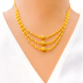 Delicate Glistening 22K Gold Three Lara Necklace Set