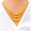 shimmering-triple-lara-22k-gold-necklace-set