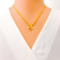 Tasteful Paisley Adorned 22K Gold Necklace Set 