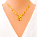 Tasteful Paisley Adorned 22K Gold Necklace Set 