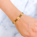 Graceful Alternating 22k Gold CZ Black Bead Bracelet 