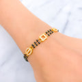 Graceful Alternating 22k Gold CZ Black Bead Bracelet 