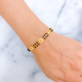 Charming Halo 22k Gold Black Bead CZ Bracelet 