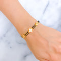 Marquise Adorned 22k Gold Black Bead CZ Bracelet 