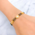 Marquise Adorned 22k Gold Black Bead CZ Bracelet 