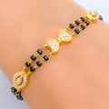 Elegant Bow 22k Gold Black Bead CZ Bracelet 