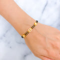 Dazzling Diamond Shaped 22k Gold CZ Black Bead Bracelet 