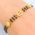 Dazzling Diamond Shaped 22k Gold CZ Black Bead Bracelet 