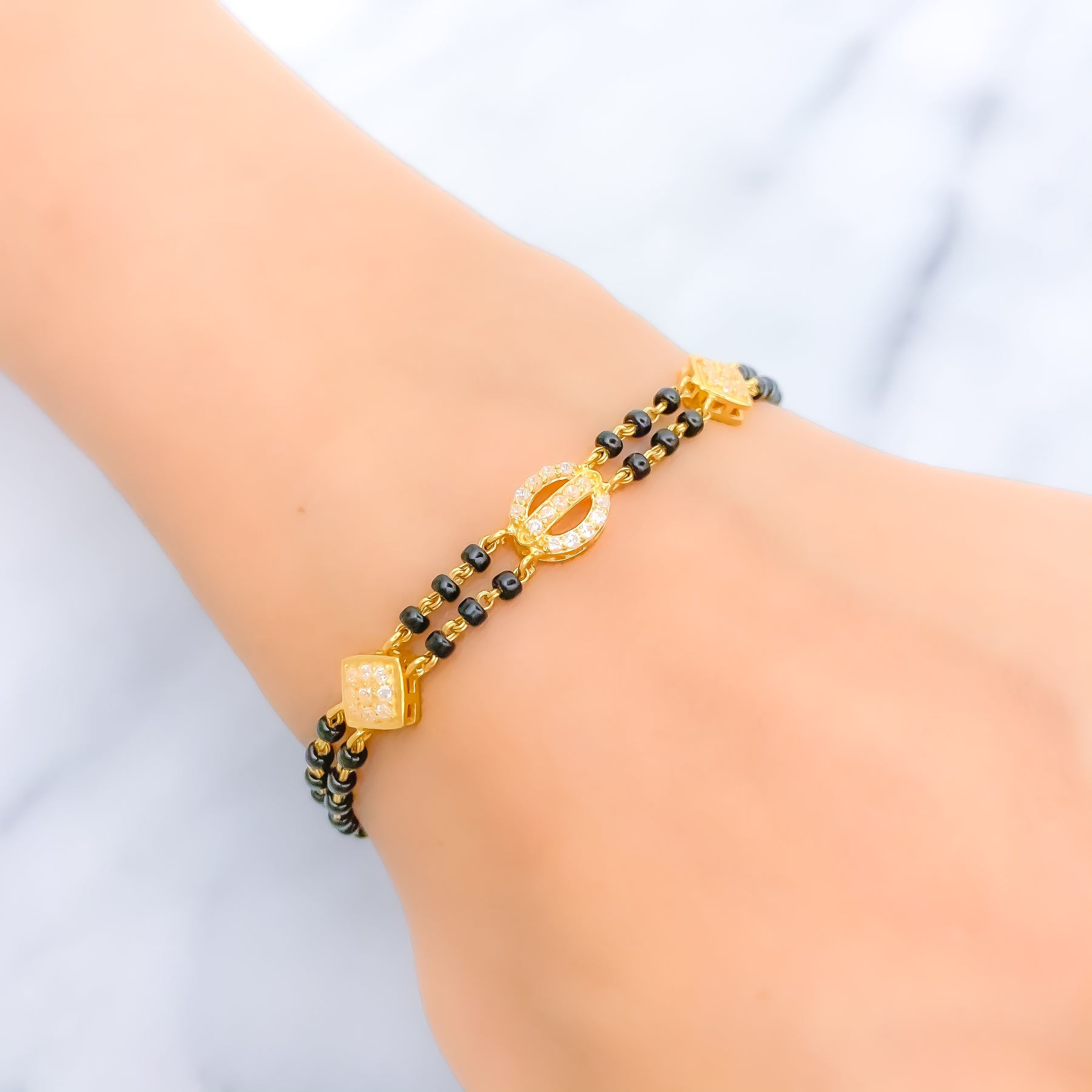 Black Cross and Gold Bracelet – Lorena Ramos Jewelry