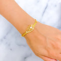 Dazzling Leaf Adorned 22k Gold CZ Bracelet