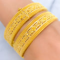 Graceful Lavish Striped 22k Gold Screw Bangles