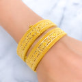 Graceful Lavish Striped 22k Gold Screw Bangles