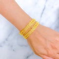 Radiant Reflective Floral Netted 22k Gold Bangles