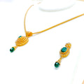 Mesmerizing Emerald Adorned 22k Gold Polki Pendant Set