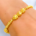 Fine Reflective Striped Orb 22k Gold Bracelet