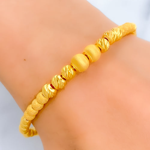 delightful-sand-finish-21k-gold-orb-bangle-bracelet
