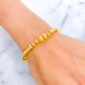 delightful-sand-finish-21k-gold-orb-bangle-bracelet