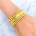 bold-shiny-21k-gold-coin-bangle-bracelet