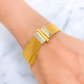 unique-hanging-chain-21k-gold-bangle-bracelet