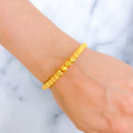 Sparkling Striped 21K Gold Orb Bangle Bracelet