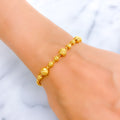 reflective-striped-orb-22k-gold-bracelet