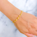 upscale-graduating-orb-22k-gold-bracelet