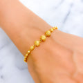 jazzy-triple-orb-22k-gold-bracelet