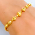 sparkling-faceted-orb-22k-gold-bracelet