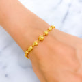 sparkling-faceted-orb-22k-gold-bracelet