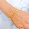 bold-striped-orb-22k-gold-bracelet