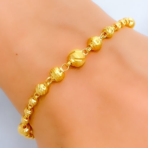 disco-orb-accented-22k-gold-bracelet