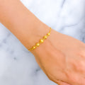 sophisticated-22k-gold-dotted-orb-bolo-bracelet
