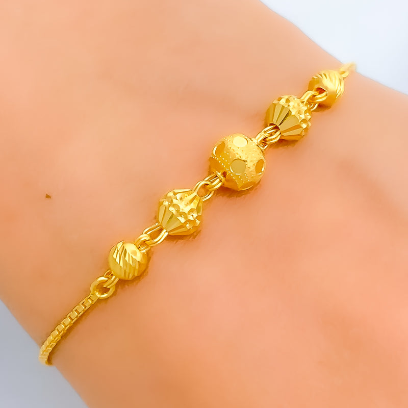 sophisticated-22k-gold-dotted-orb-bolo-bracelet
