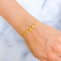 glossy-multi-bead-22k-gold-bolo-bracelet