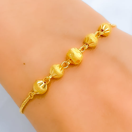 sleek-shiny-22k-gold-orb-bolo-bracelet