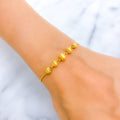 sleek-shiny-22k-gold-orb-bolo-bracelet